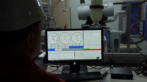 Production operator controls the data indicators Video stock 129639791