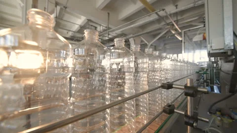 Production of PET bottles. Many plastic bottles close-up Stock-Footage 103457785
