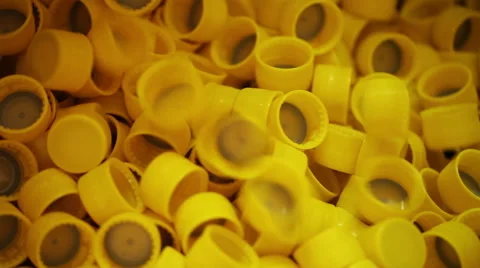 Production Of Plastic Bottle Caps. Close-up. Stock Footage 56226979
