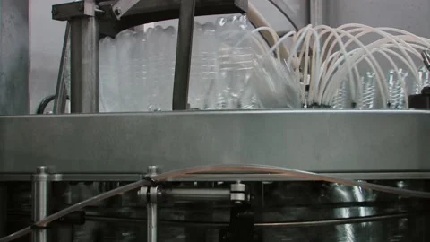 Production of plastic bottles for juce or beer on the factory Stock Footage 91335161