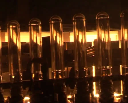 Production of plastic bottles. Transparent PET bottles production line Video stock 24951734