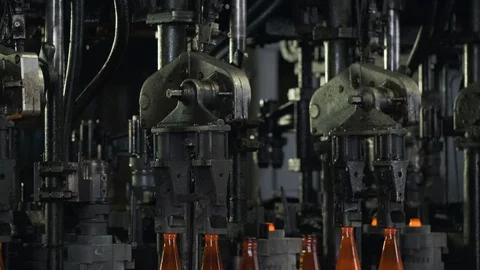 Production process of beer bottles at the plant. Glass recycling. Molten glass. Stock Footage 108394803