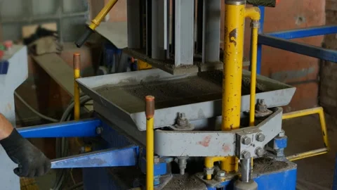 Production process of concrete tile blocks in brick form for road surface cover Stock Footage 95110676