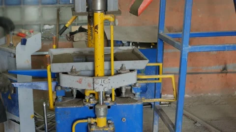 Production process of segmental pavers for road surface covering. Work of press Stock Footage 95109099