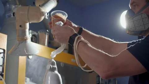 Production of a prosthetic leg. Creates part of the leg above the knee. Pours Stock Footage 120125894
