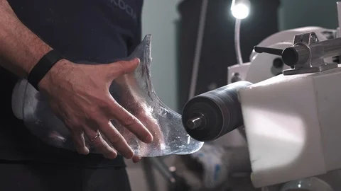Production of a prosthetic leg. A man creates a part of the leg above the knee Stock Footage 120134470