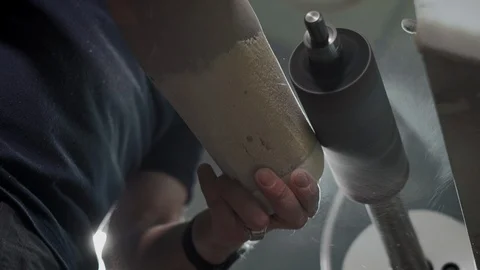 Production of a prosthetic leg. A man creates a part of the leg above the knee 스톡 동영상 120146622
