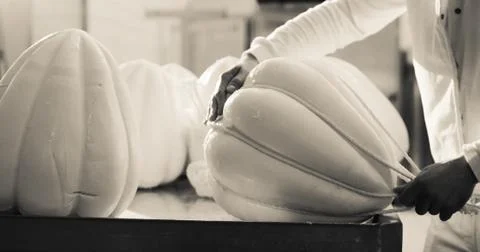 Production of provolone cheese. Stock Photos