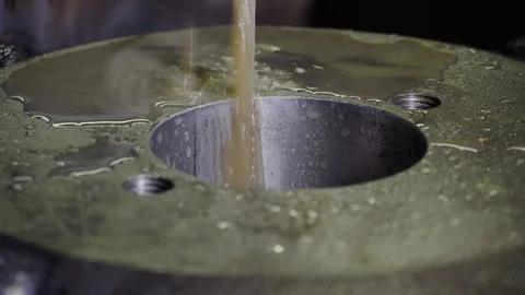 In the production room in a metal structure, the machine makes a slot. Stock Footage 116650005