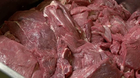 Production of Sausages at the Meat Processing Plant. Equipment for Meat Stock Footage 98887803