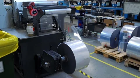 Production Of Self-Adhesive Labels.Transparent Blank Label Stock Footage 238505693