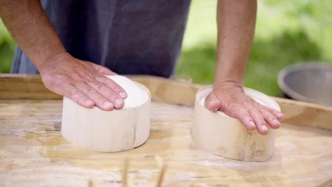 The production of sheep cheese. The processing is done following the ancient Stock-Footage 91523439