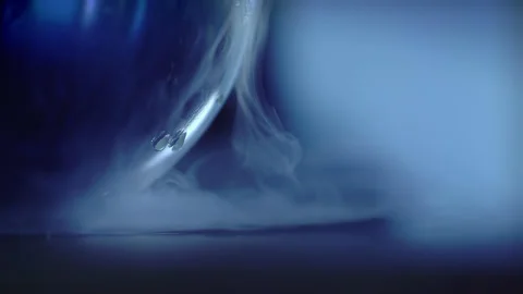 The production of smoke from the reaction of a chemical experiment Stock Footage 257031153