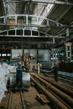 The production of ventilation and gutters, loading on a crane Stock Photos