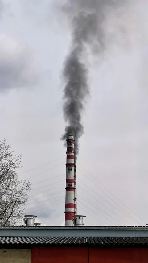 Production, which dregiets environment. Black smoke from chimney flies straight Stock Footage 157758978