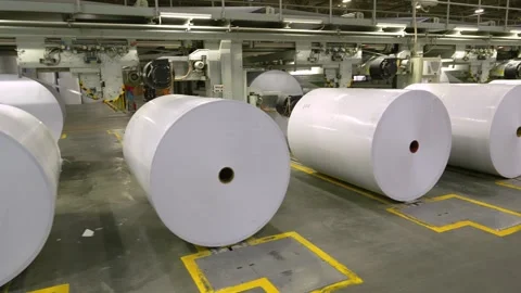 Production of white paper. Rolls of white paper. An A4 paper production machine Stock Footage 315887174