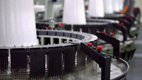 Production of white polypropylene flat yarn for the production of industrial  Stock Footage 141232179
