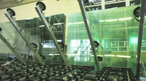 Production of Windows: conveyor table takes the glass sheet Stock Footage 45547773