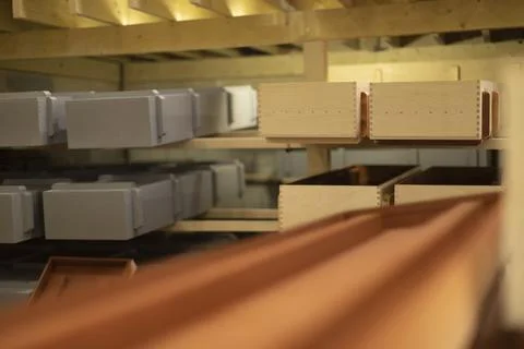 Production of wood boxes. Boxes in workshop. Wood processing shop. Stock Photos