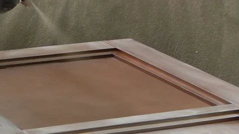 Production of wooden doors. The process of aging wood on the door Stock-Footage 97596590