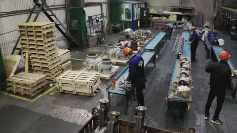 Production workers doing their job at the factory environment Stock Footage 149970533