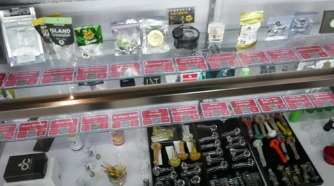 Products Display Case at Marijuana / Cannabis Dispensary Retailer Stock Footage