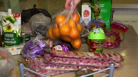 Products spread on the kitchen table. 4K. Video stock 59847822