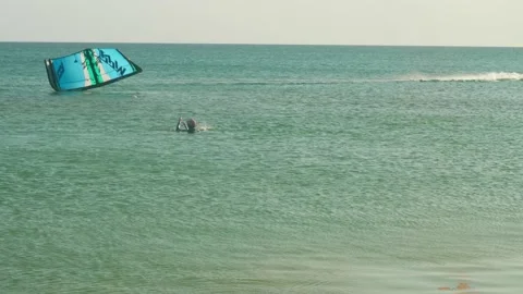 Professioanl kiter is doing kiting and talking. Summer activities Video stock 139870975