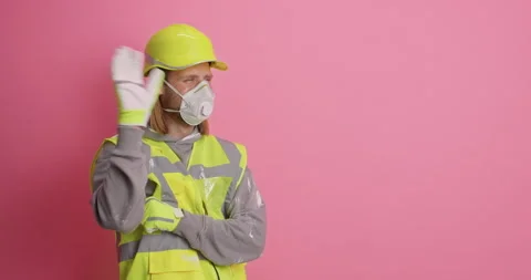 Profession and construction concept. Positive male builder dressed in protective Stock Footage 156225192