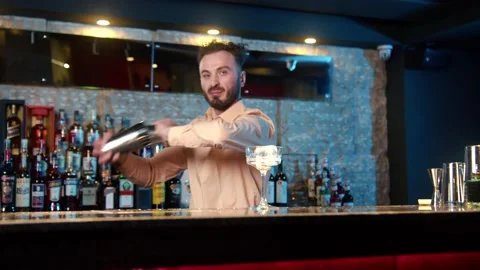 The profession of bartender. The process of making a cocktail at a bar Stock Footage 239101457
