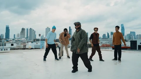 Profession break dancer practice B-boy dance with friends at roof top. hiphop. Stock Footage 258214235