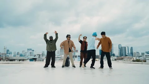 Profession break dancer practice B-boy dance with friends at roof top. hiphop. Stock Footage 258419322