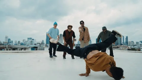 Profession break dancer practice B-boy dance with friends at roof top. hiphop. Stock Footage 262647554