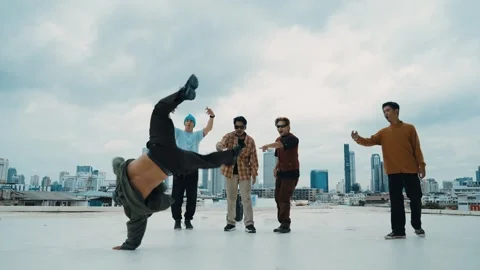 Profession break dancer practice B-boy dance with friends at roof top. hiphop. Stock Footage 263021408