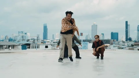 Profession break dancer practice B-boy dance with friends at roof top. hiphop. Stock Footage 263415212