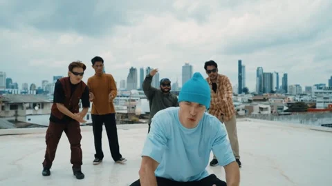 Profession break dancer practice B-boy dance with friends at roof top. hiphop. Stock Footage 263678651