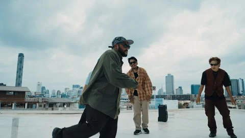 Profession break dancer practice B-boy dance with friends at roof top. hiphop. Stock Footage 264450409