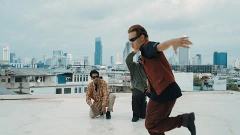 Profession break dancer practice B-boy dance with friends at roof top. hiphop. Stock Footage 264977265