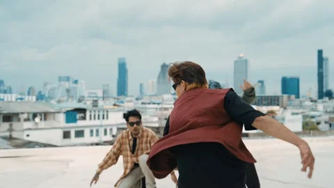 Profession break dancer practice B-boy dance with friends at roof top. hiphop. Stock Footage 266752194