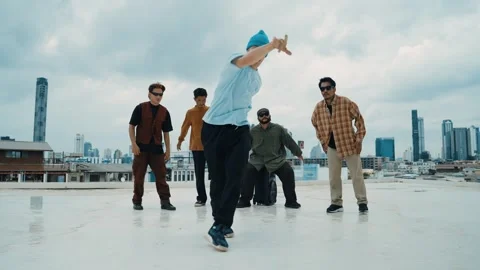Profession break dancer practice B-boy dance with friends at roof top. hiphop. Stock Footage 266752584
