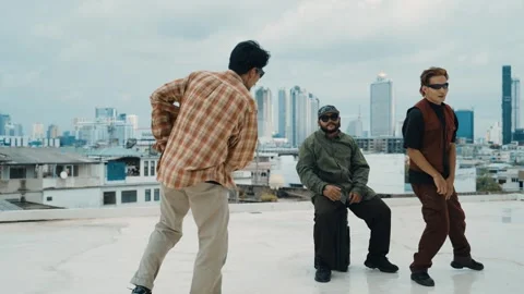Profession break dancer practice B-boy dance with friends at roof top. hiphop. Stock Footage 266946226