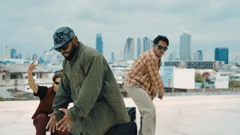 Profession break dancer practice B-boy dance with friends at roof top. hiphop. Stock Footage 267920917