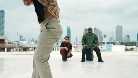 Profession break dancer practice B-boy dance with friends at roof top. hiphop. Stock Footage 270040340