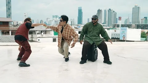 Profession break dancer practice B-boy dance with friends at roof top. hiphop. Stock Footage 270086862