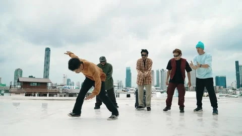 Profession break dancer practice B-boy dance with friends at roof top. hiphop. Stock Footage 271025568