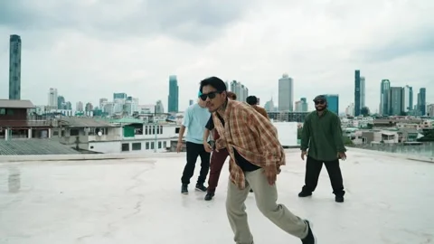 Profession break dancer practice B-boy dance with friends at roof top. hiphop. Stock Footage 271472517