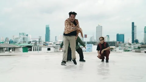 Profession break dancer practice B-boy dance with friends at roof top. hiphop. Stock Footage 272887600