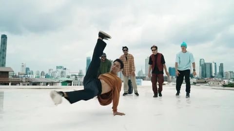 Profession break dancer practice B-boy dance with friends at roof top. hiphop. Stock Footage 272989517