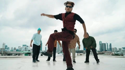 Profession break dancer practice B-boy dance with friends at roof top. hiphop. Stock Footage 273833761
