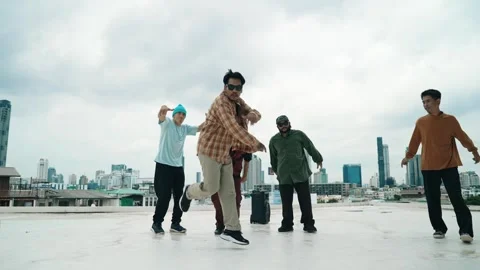 Profession break dancer practice B-boy dance with friends at roof top. hiphop. Stock Footage 275012758